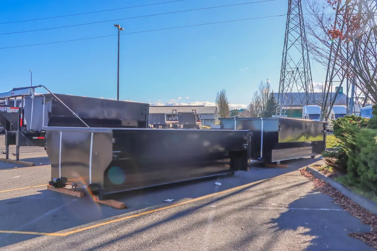 Roll-off dumpster ready for waste disposal at job site for Roofing Dumpster Rental in Milford